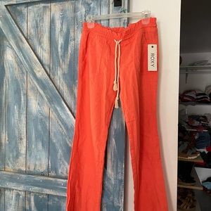 Roxy Oceanside beach pants. Coral color